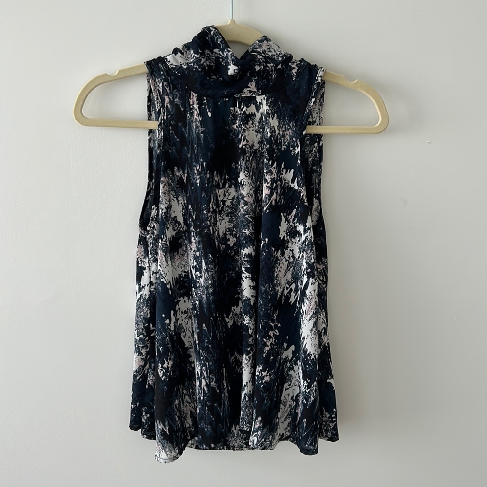 High neck, sleeveless silk top